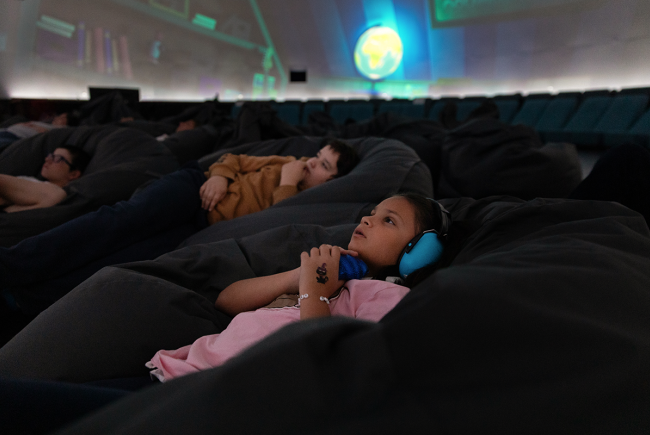 During Sensory-friendly Moments, the Planétarium reduces the number of spectators in its theaters.