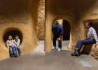 A family explores one of the alcoves of the Insectarium